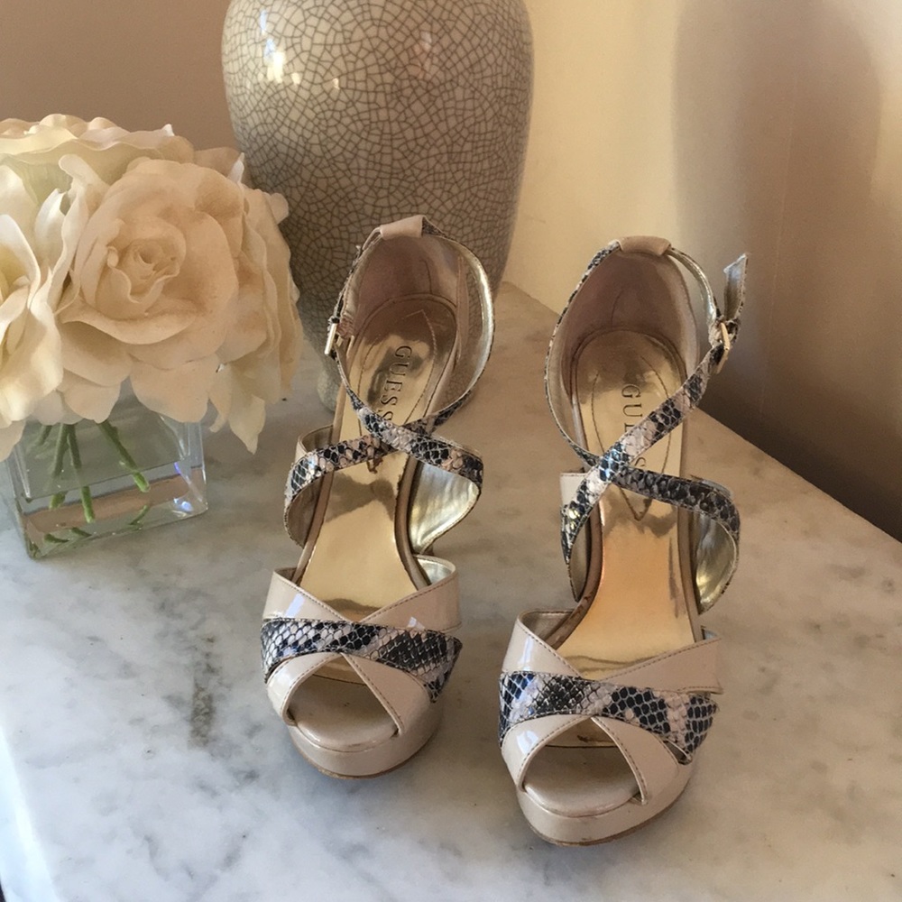 Guess platform high heeled sandals.